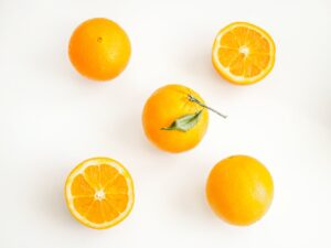 oranges on white surface